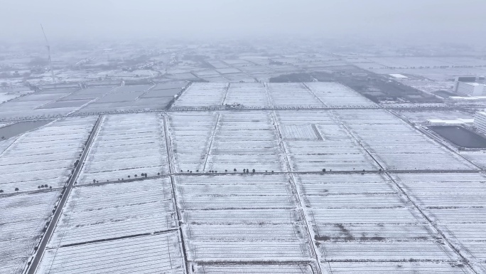 航拍农村乡镇集镇田野平原雪景