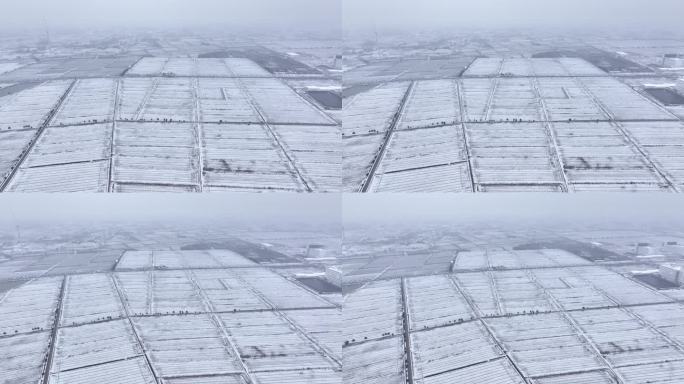 航拍农村乡镇集镇田野平原雪景