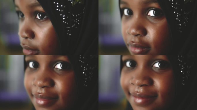 一个女孩看着外国小孩非洲小女孩特写实拍