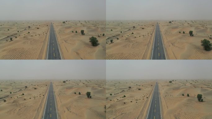 航拍汽车行驶在笔直的沙漠公路新疆高速公路