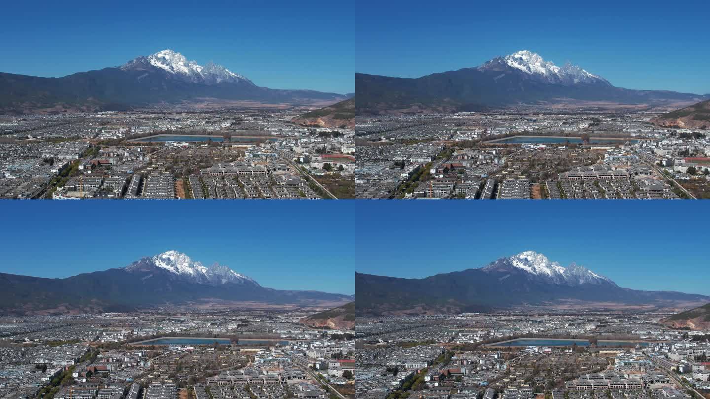 航拍云南旅游丽江古城和玉龙雪山