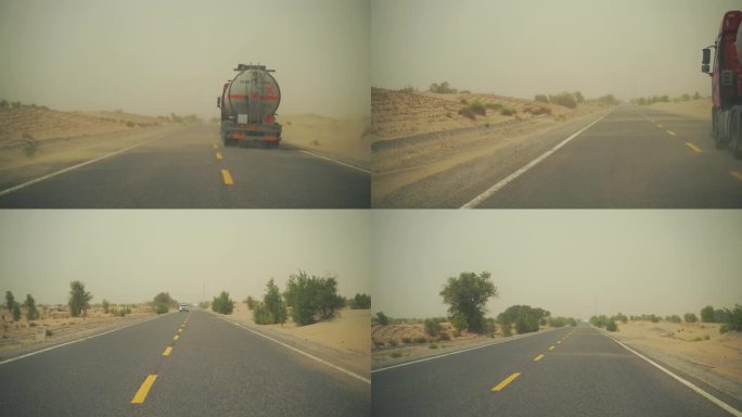 汽车行驶在沙漠公路油罐车行驶车窗外风景