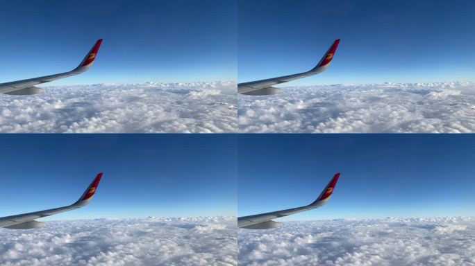 飞机云层上透过窗户看云层云海