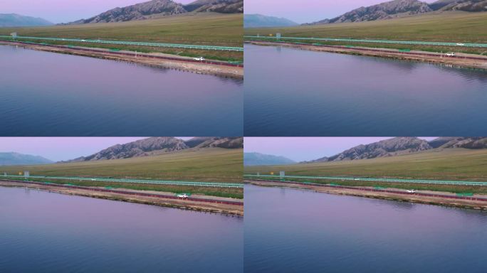 航拍汽车公路行驶新疆赛里木湖风景自然风光