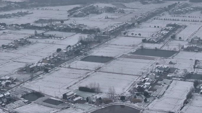 航拍农村乡镇集镇平原雪景