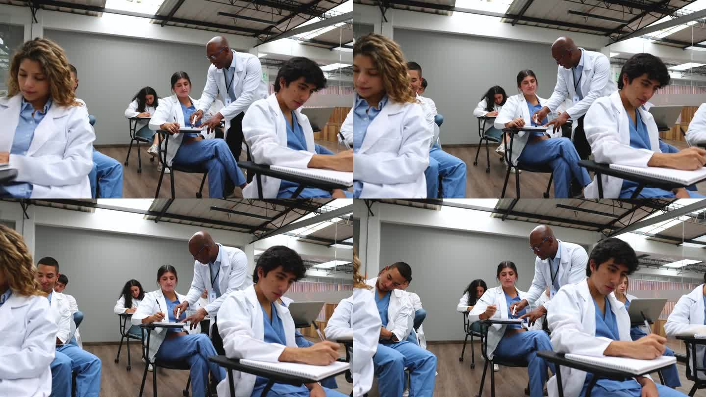 快乐的黑人医生在课堂上向女医学生解释一个概念，而其他学生在做他们的笔记本