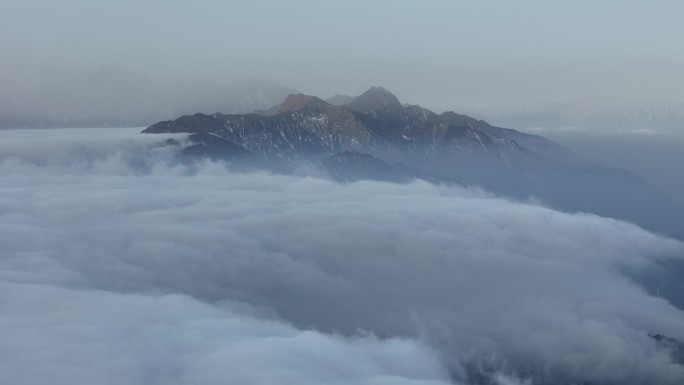 航拍四川绵阳千佛山眺望川西雪山云海