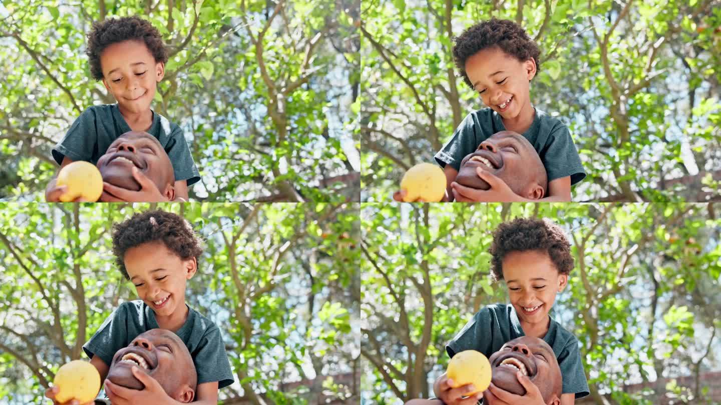 快乐的父亲，快乐的孩子，快乐的果园里的果树，为了营养，为了健康，为了阳光或夏天的欢笑。黑人家庭，父母