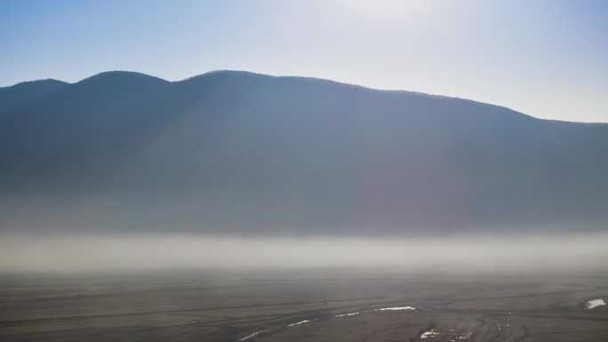 东北农村日出晨雾美景