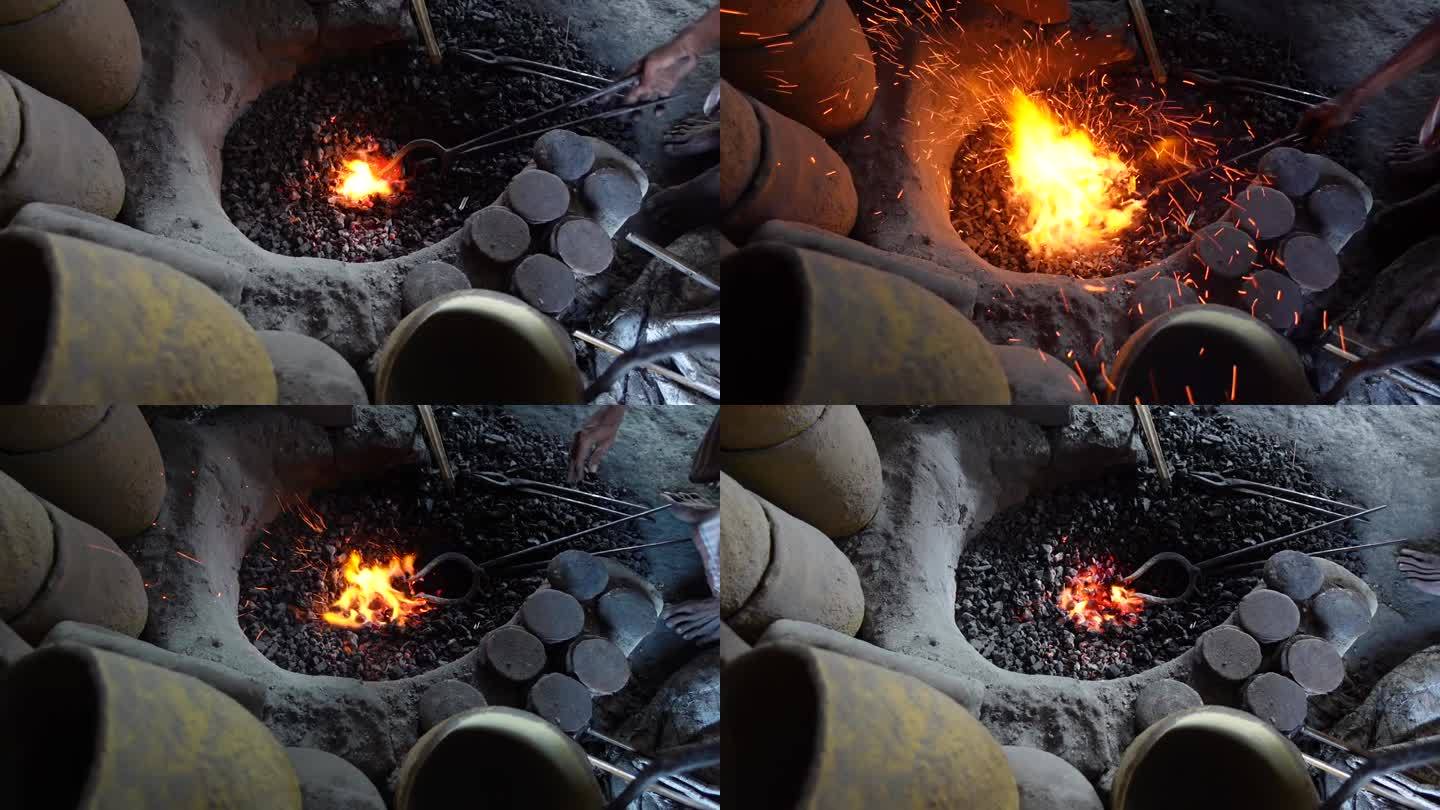 在一家工厂里，一块青铜正在燃烧着煤。一家传统的铜、黄铜家电工厂。