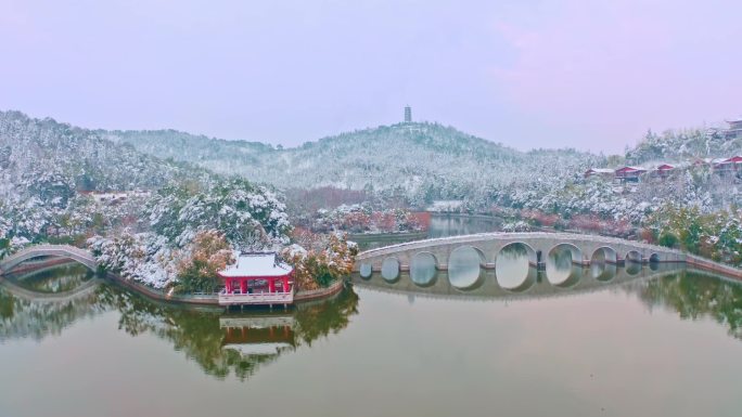 湖泊拱桥山亭子塔空雪景镜头