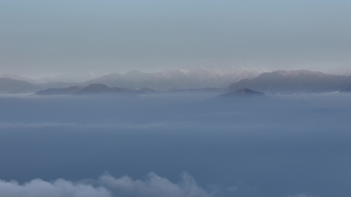 航拍四川绵阳千佛山眺望川西雪山云海