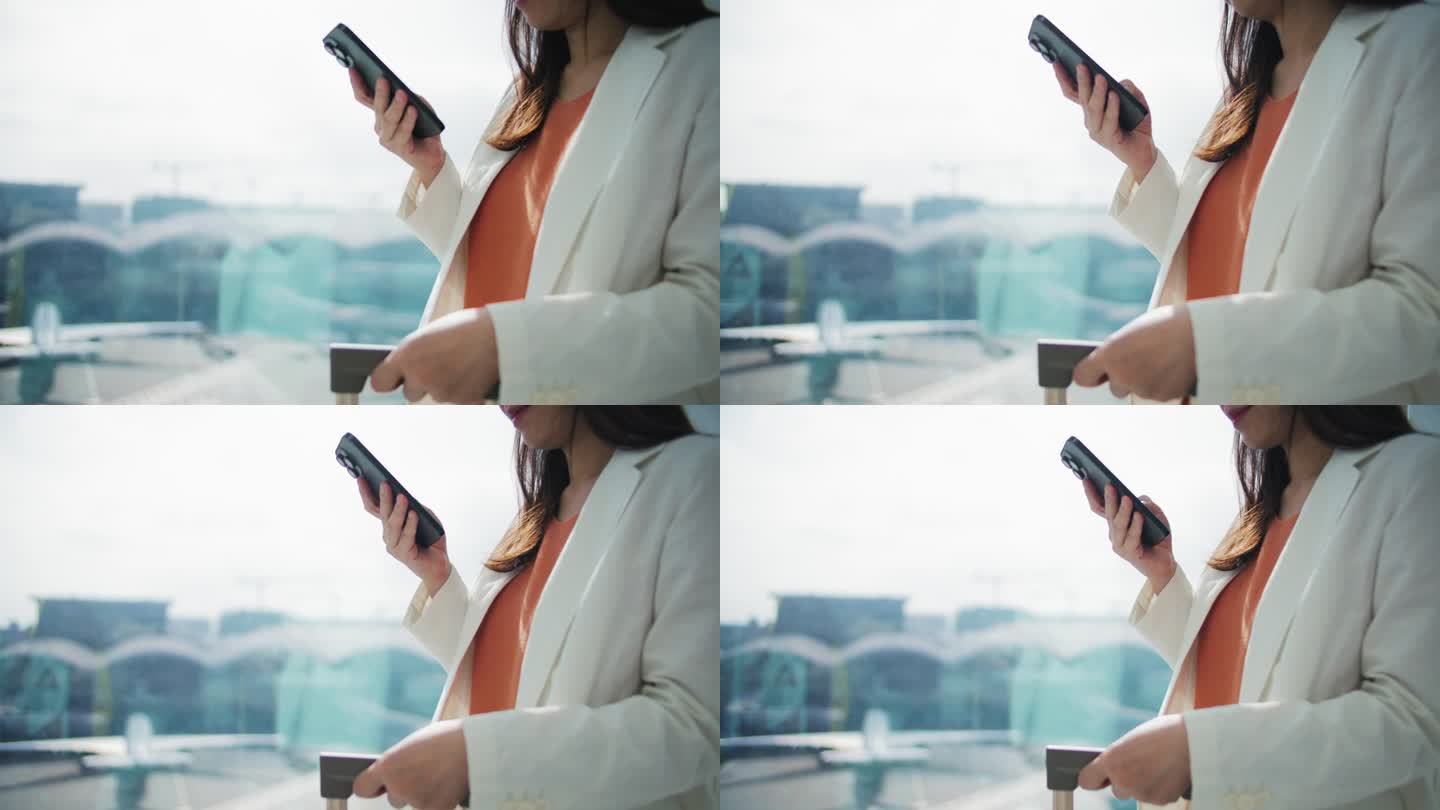 女商人使用智能手机上网查询旅行目的地