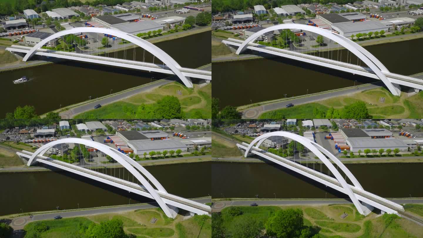 荷兰Zuidhorn的现代白色“Bert Swart”拱桥空中轨道