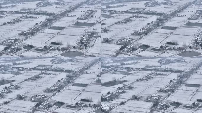 航拍农村乡镇集镇平原雪景