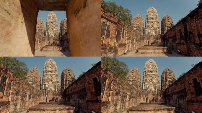 素可泰历史公园的寺沙瓦。三座宝塔由红土墙包围。墙内，西面的维哈恩，用红土建造的罗布里或印度风格