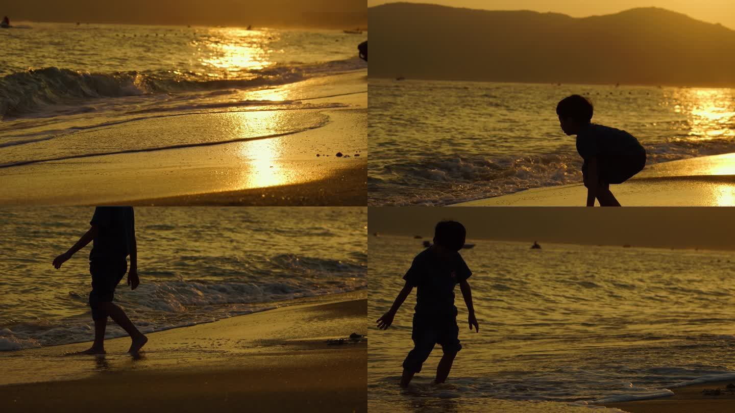 夕阳儿童海边玩耍