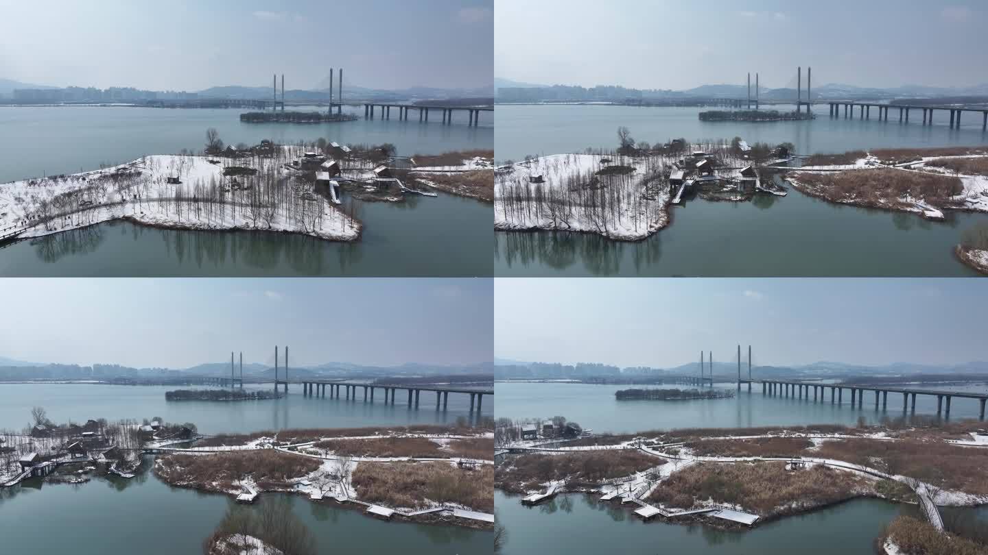 航拍襄阳汉江月亮湾湿地公园冬天雪景风光