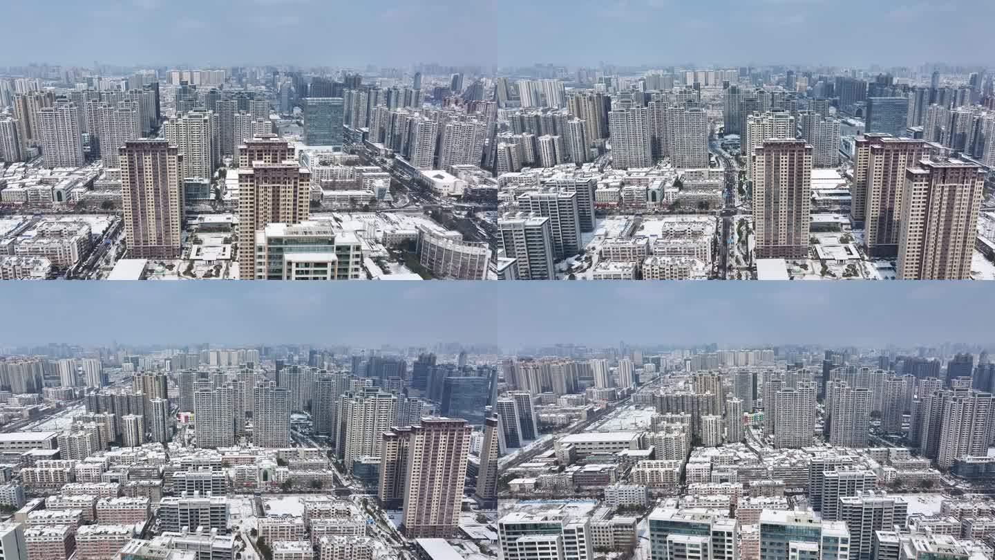 航拍襄阳樊城区高楼大厦雪景城市建筑风光D