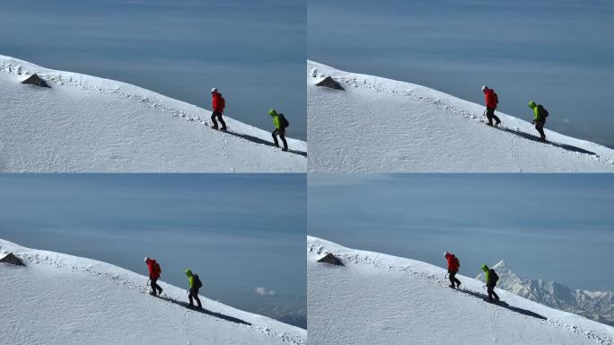 雪山上冒险攀登探险的人