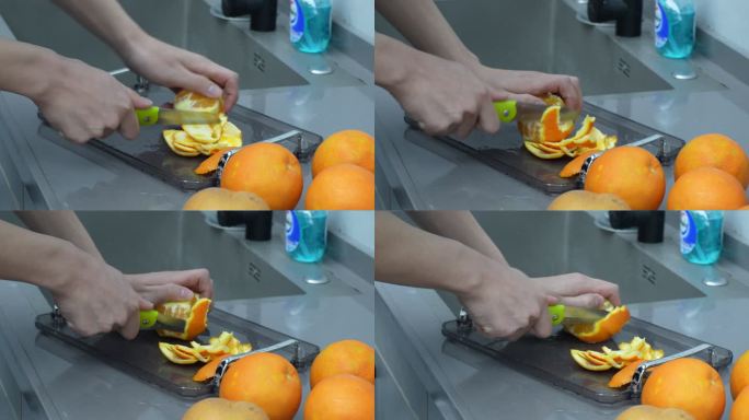男生切水果橙子圣诞水果拼盘