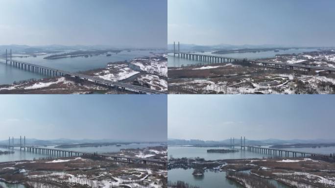 航拍襄阳汉江月亮湾湿地公园冬天雪景风光
