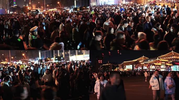 城市夜晚人群拥挤场面路口人群