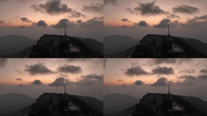 日出时分湖南衡山祝融峰上的古建筑和发射塔