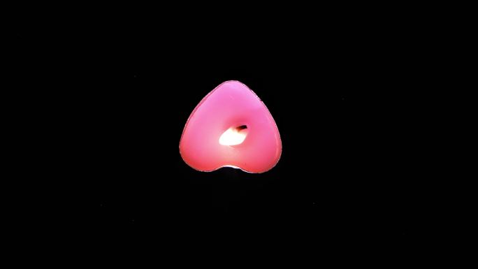 红色蜡烛粉色蜡烛红色蜡烛摆成心形心形蜡烛