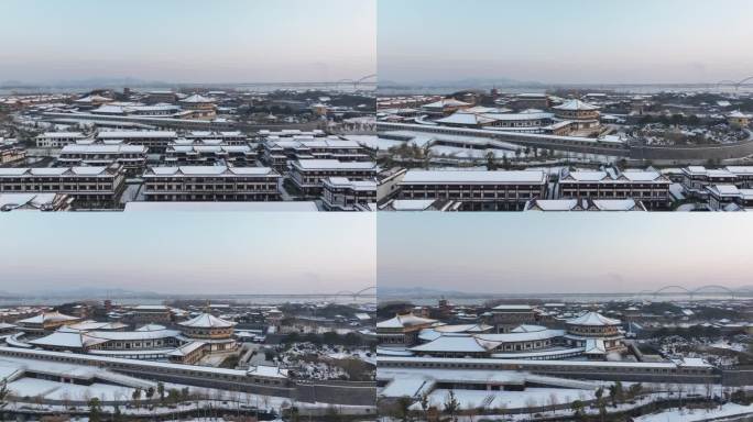 航拍襄阳唐城景区影视城雪景城市建筑风光
