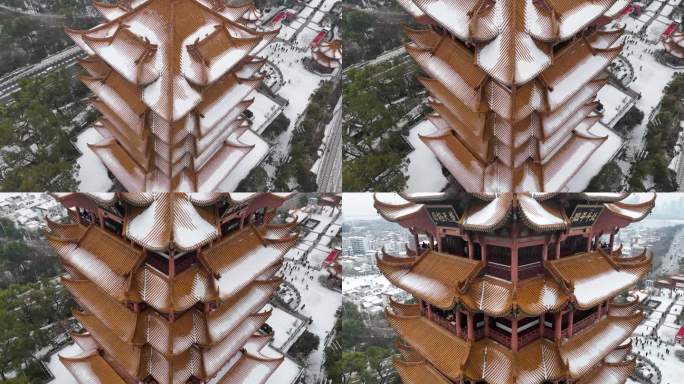 武汉航拍黄鹤楼古建筑雪景下雪红楼长江大桥