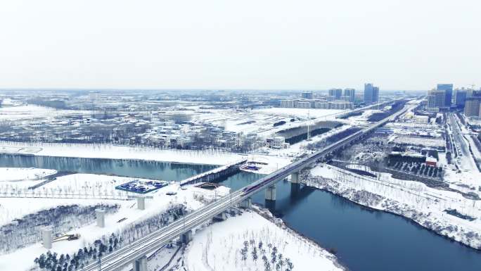 航拍漯河京广高铁澧河桥雪景