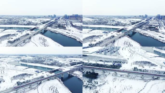 航拍漯河京广高铁澧河桥雪景