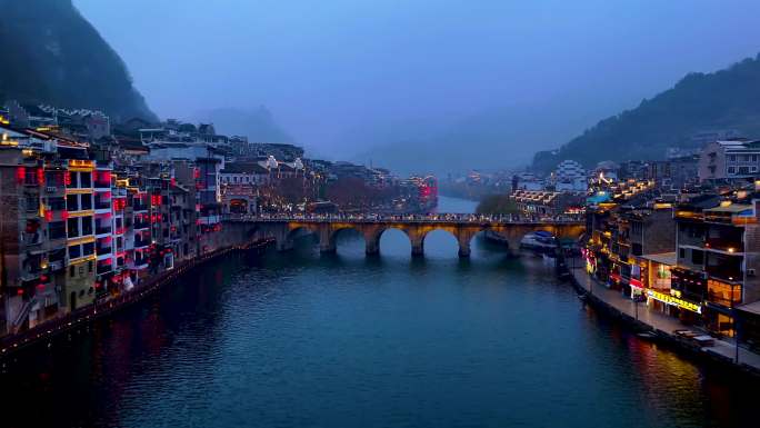 航拍贵州镇远古镇舞阳河畔灯火古城夜景-