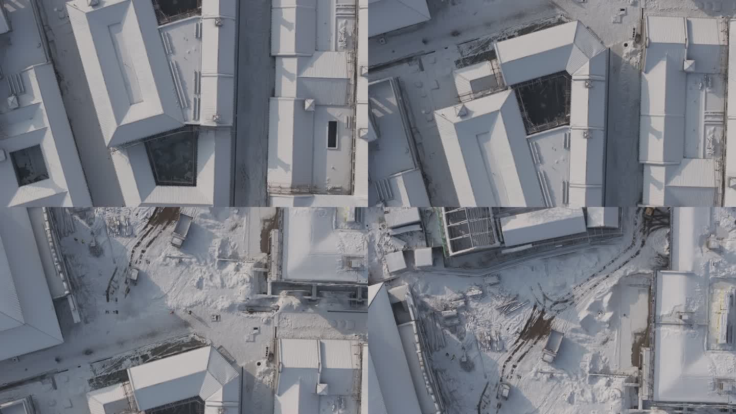 航拍俯瞰威海市环翠区栖霞街改造施工雪景