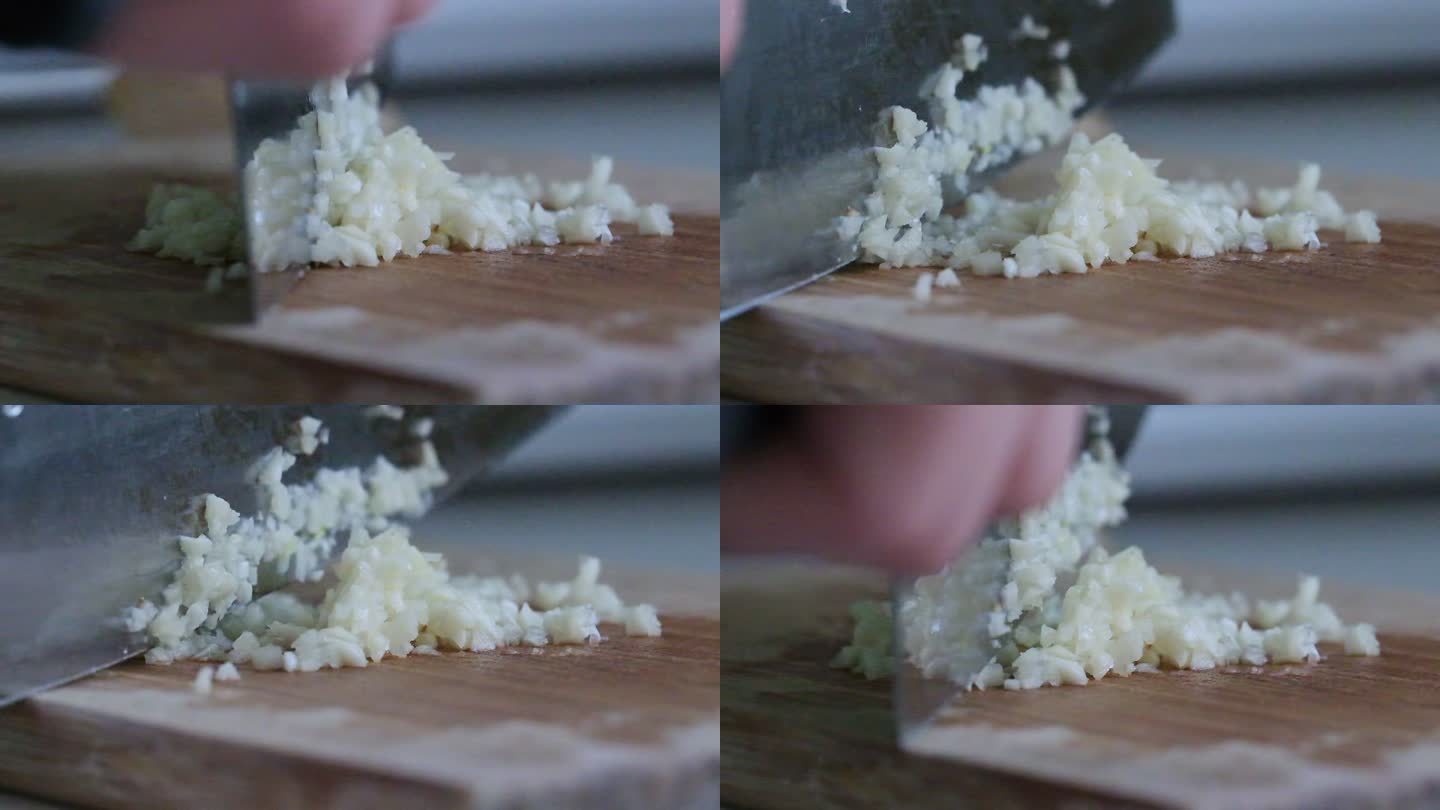菜刀在砧板上切大蒜的超慢动作特写