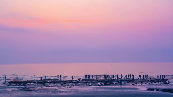 涠洲岛海滩沙滩清晨黎明拾贝壳看日出延时