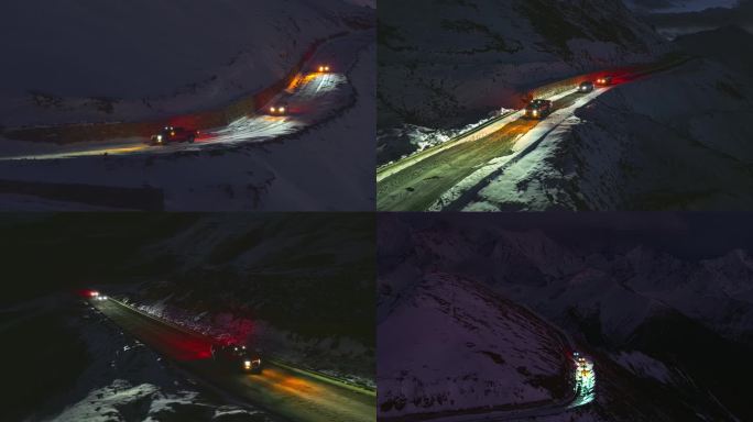 夜晚雪地雪山上行驶的汽车