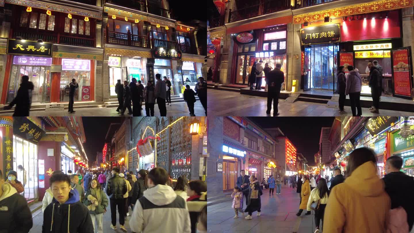 北京前门喜庆春节人流穿梭游人拍照过年逛街