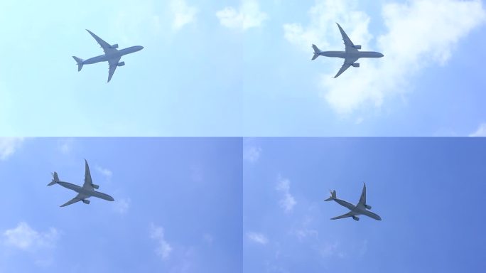 客运飞机在蓝天白云上空飞行
