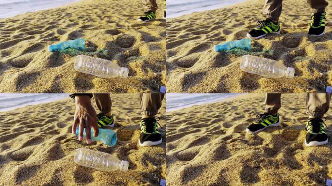 海滩捡走塑料垃圾特写