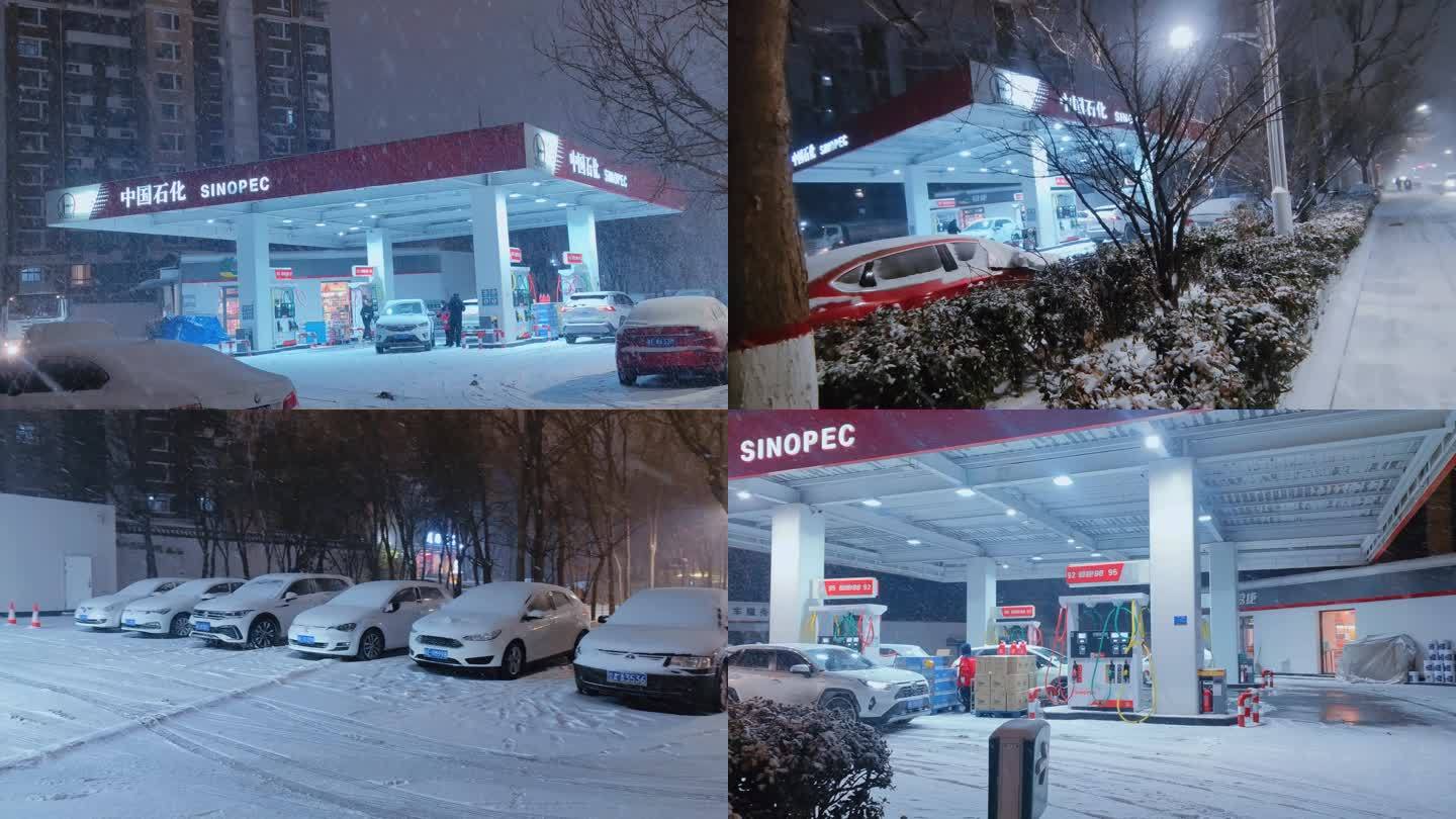 风雪夜灯火通明仍在工作的加油站