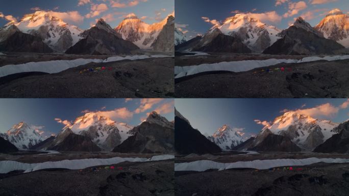从巴基斯坦喀喇昆仑山脉的康科迪亚营地俯瞰乔戈里峰和布罗德峰的日落
