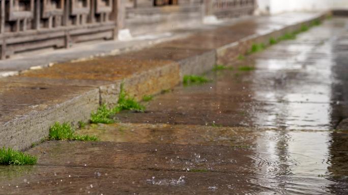 江南中式古典园林，庭院雪后屋檐滴水到地面