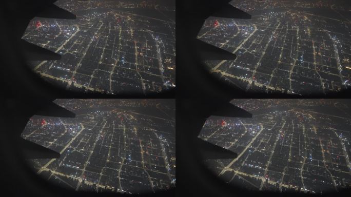 飞机机内视角窗外城市夜景画面