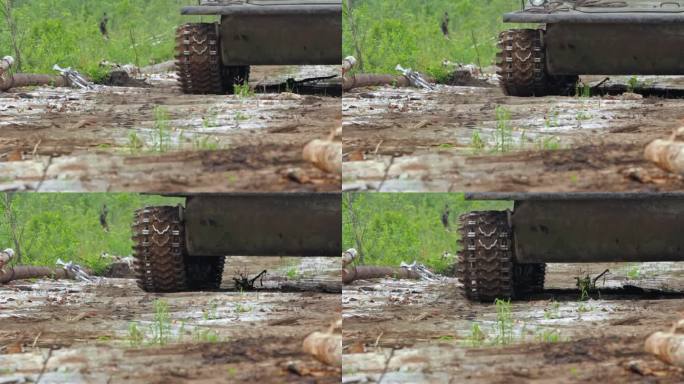 详细观察坦克履带的复杂运动，说明车辆处理崎岖地形的能力