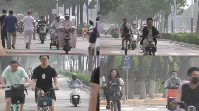 骑行忙碌都市生活行人市井汽车人文雾霾天气