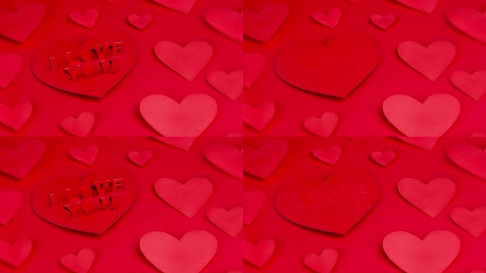 字母，我爱你!爱的宣言!情人节卡片。爱情的概念，情人节，婚礼。红心是用彩色纸在红色的背景上做成的。动