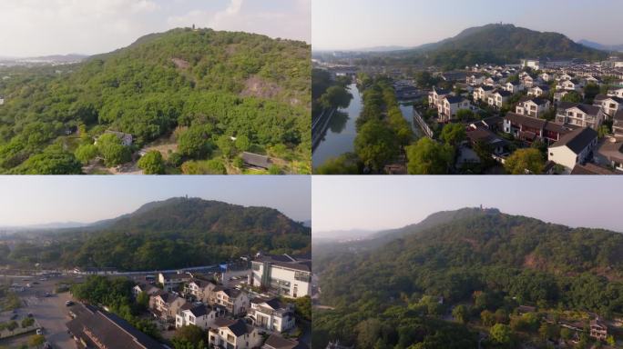 航拍无人机前推山顶寺庙建筑森林高山蓝天