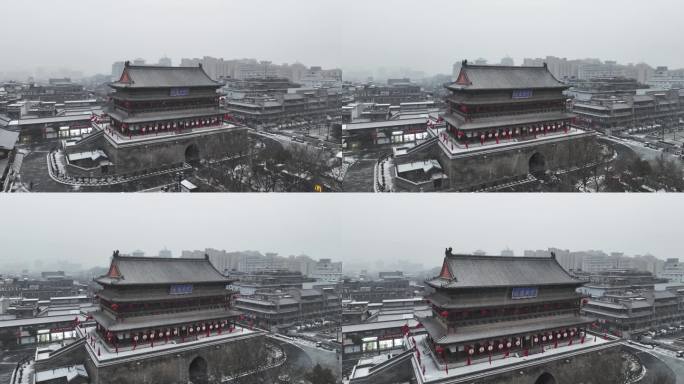 陕西省西安市正在下雪的西安鼓楼雪景景观